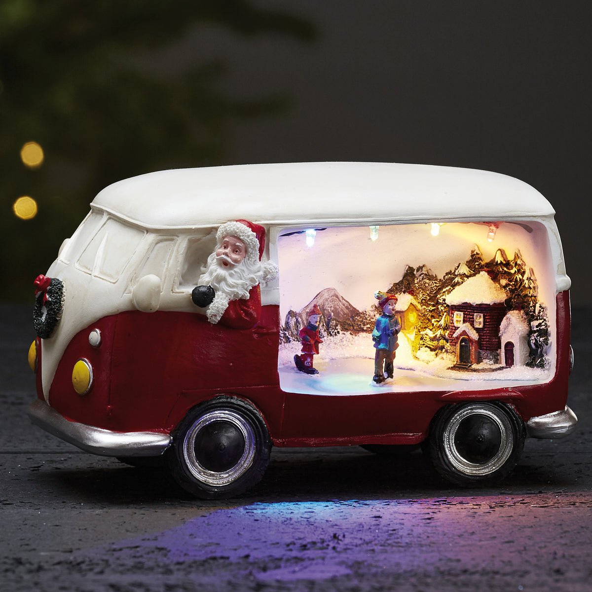 Weihnachtsbus | MERRYVILLE | Weihnachtsmann als Fahrer | 4 bunte LEDs