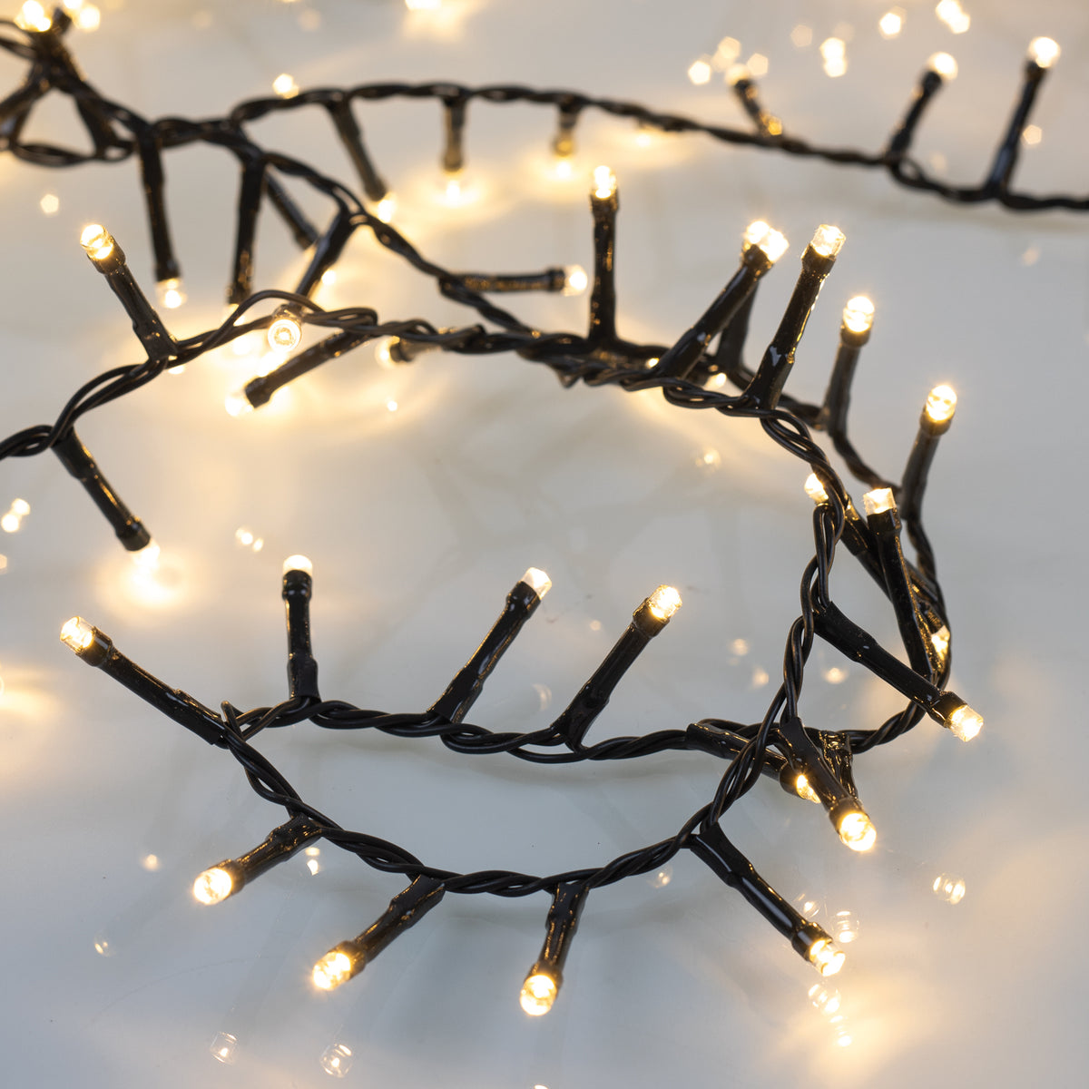 LED-Clusterlichterkette | Warmweiß | Acht Lichtfunktionen | Grünes Kabel