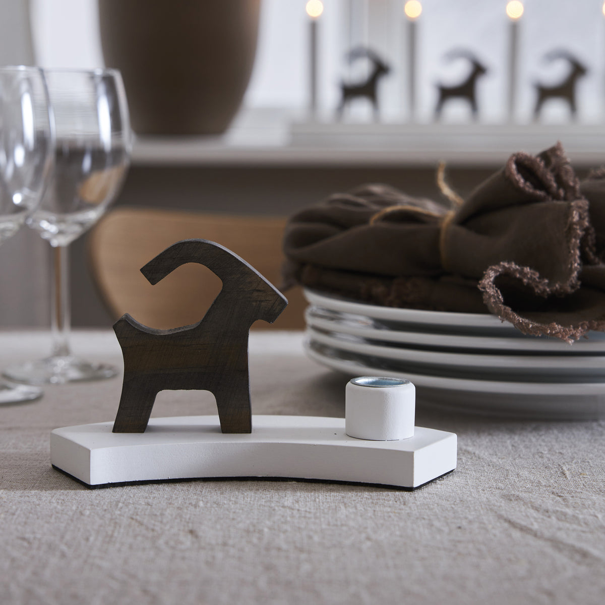 Candle holder | BRUSE | Christmas goat | for 1 dinner candle