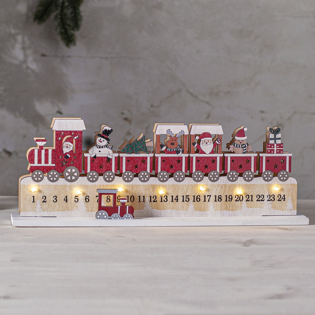 Christmas candle arch | CALENDAR | Santa Claus on a train | 7 warm white LEDs | W 380 mm